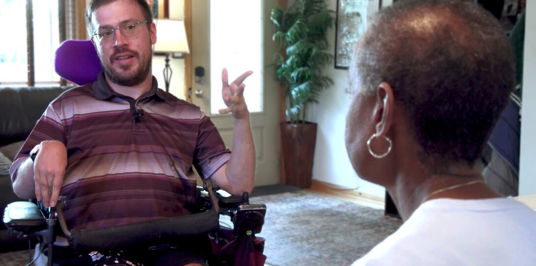 Ann interviewing Justin about his experiences.