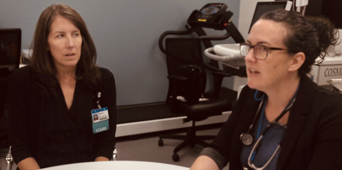 Sarah Ushkow conversing alongside Dr. Erin Hickey.